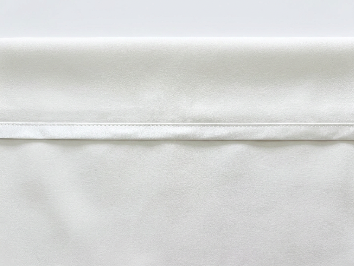 Close-up of Rêve & Silk bias-bound seam construction